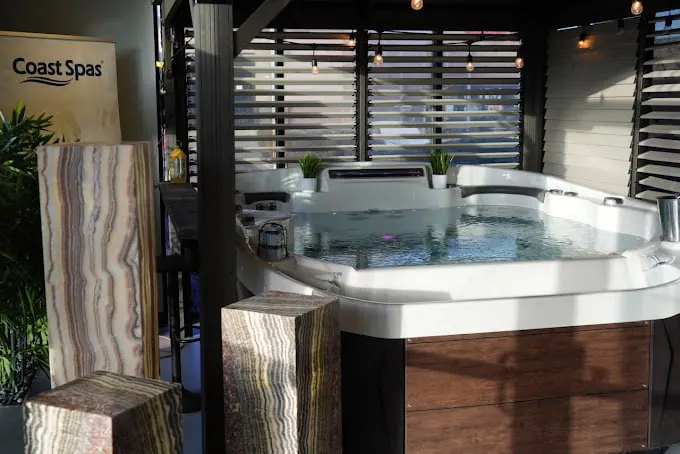 Hot tubs on display inside the Regency showroom in Aurora, Colorado