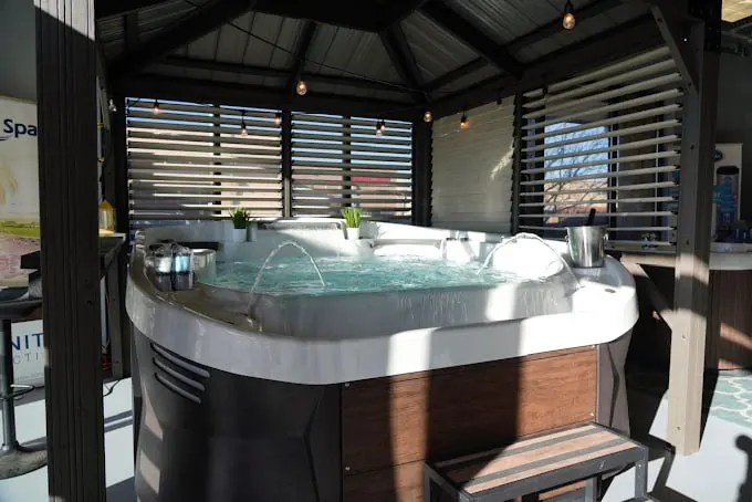 Hot tubs on display inside the Regency showroom in Westminster, Colorado